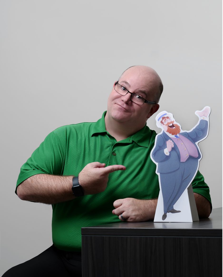 Author Kevin Rooney with a Mr. Tootsee McGootsee cutout.